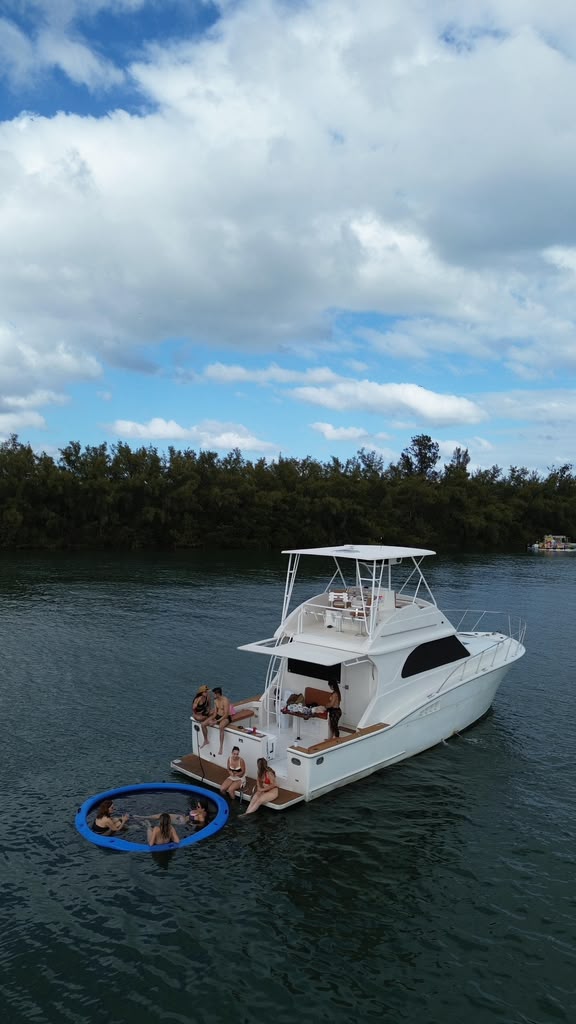 At anchor close to the mangroves, guests out on the float