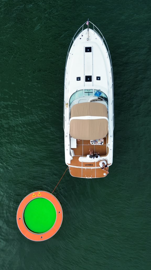 Straight down over the teak cockpit with the floating pool astern